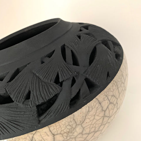 Detail of Ceramic vessel with white crackled lower and black carved upper section with ginkgo leaves by Akiko Koiso at Cottage Curator - Sperryville VA Art Gallery