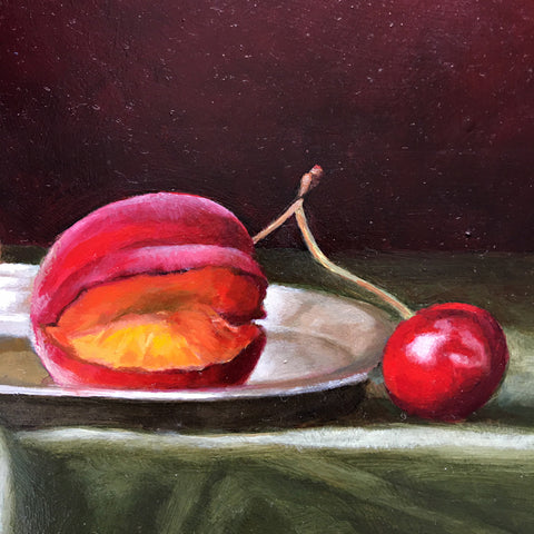 Detail of long, narrow still life with green tablecloth against a dark red background and red apricots by Davette Leonard at Cottage Curator - Sperryville VA Art Gallery