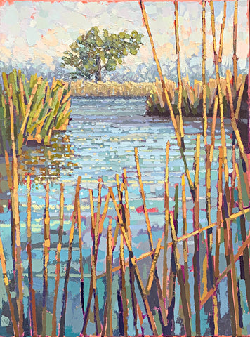 Painting of a marsh on the bay with yellow grasses against blue water, tree in background and warm glow of afternoon sun by Joan Wiberg at Cottage Curator - Sperryville VA Art Gallery