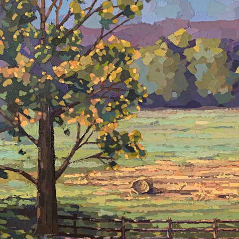 Detail of vertical landscape with trees and fence in the foreground and bales of hay in a field by Joan Wiberg - Cottage Curator - Sperryville VA Art Gallery