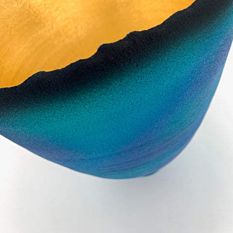 Detail of blue and green ceramic bowl with rough edge and gold interior by Cheryl Williams at Cottage Curator - Sperryville VA Art Gallery